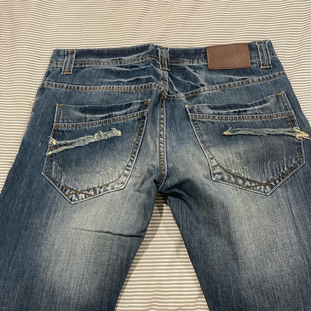 Brand new Leoguti jeans. They are too big for me.